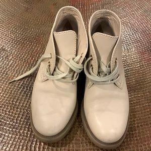 Chanel booties comfortable solved soles